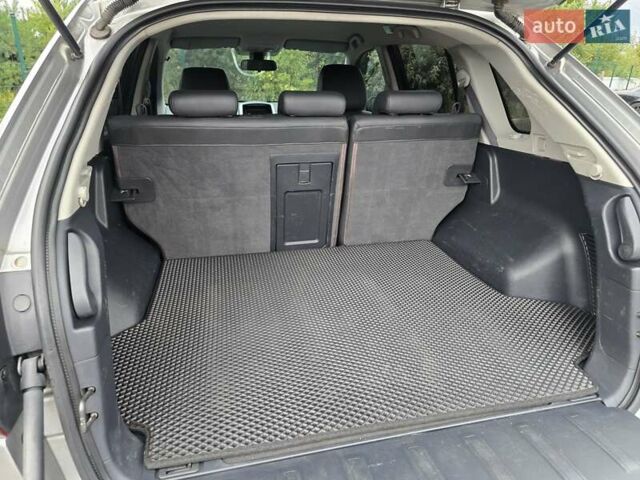 Сірий Рено Колеос, об'ємом двигуна 2 л та пробігом 289 тис. км за 7999 $, фото 69 на Automoto.ua