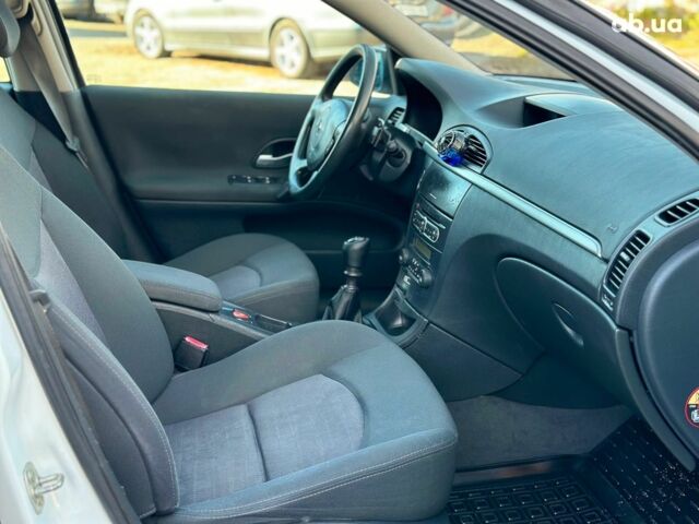 Белый Рено Лагуна, объемом двигателя 1.9 л и пробегом 231 тыс. км за 4990 $, фото 35 на Automoto.ua