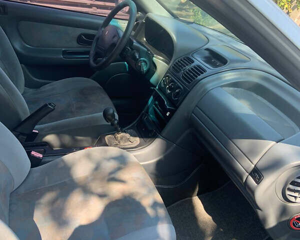 Білий Рено Лагуна, об'ємом двигуна 2 л та пробігом 330 тис. км за 2500 $, фото 11 на Automoto.ua