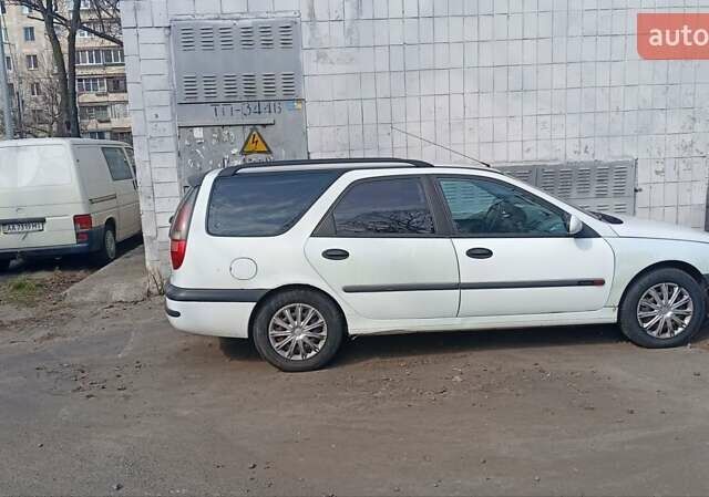 Белый Рено Лагуна, объемом двигателя 1.8 л и пробегом 400 тыс. км за 2500 $, фото 1 на Automoto.ua