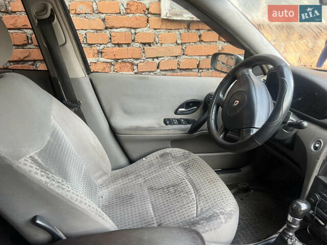 Белый Рено Лагуна, объемом двигателя 1.9 л и пробегом 270 тыс. км за 1999 $, фото 5 на Automoto.ua