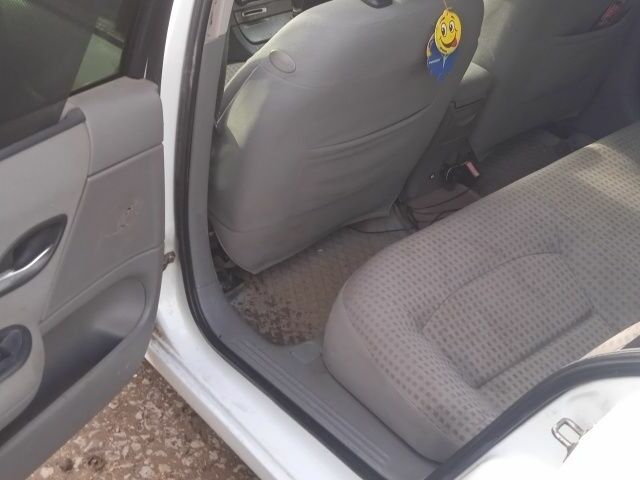 Білий Рено Лагуна, об'ємом двигуна 1.9 л та пробігом 65 тис. км за 799 $, фото 6 на Automoto.ua