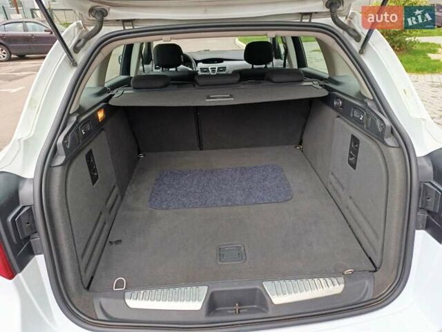 Рено Лагуна 2009 в Харькове на Automoto.ua Белый Рено Лагуна, объемом двигателя 1.46 л и пробегом 197 тыс. км за 5850 $, фото 20 на Automoto.ua