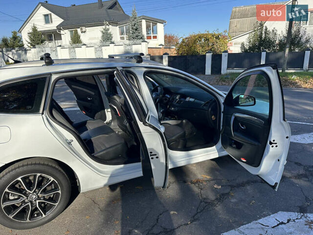 Белый Рено Лагуна, объемом двигателя 1.46 л и пробегом 290 тыс. км за 6999 $, фото 58 на Automoto.ua