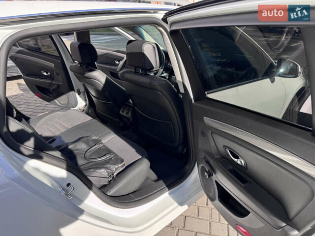 Белый Рено Лагуна, объемом двигателя 1.5 л и пробегом 201 тыс. км за 6300 $, фото 12 на Automoto.ua