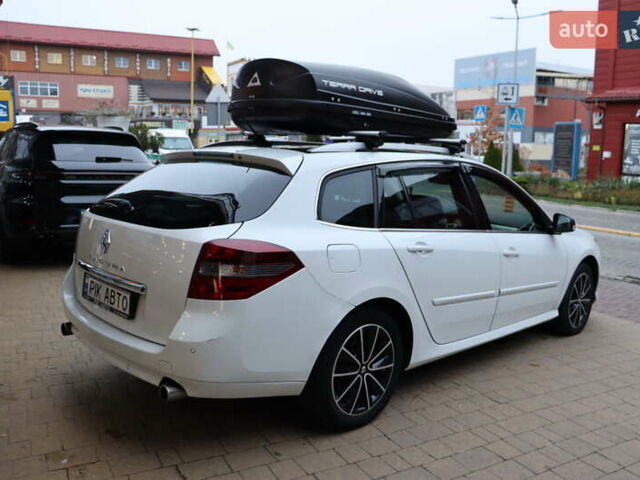 Белый Рено Лагуна, объемом двигателя 2 л и пробегом 247 тыс. км за 9900 $, фото 2 на Automoto.ua