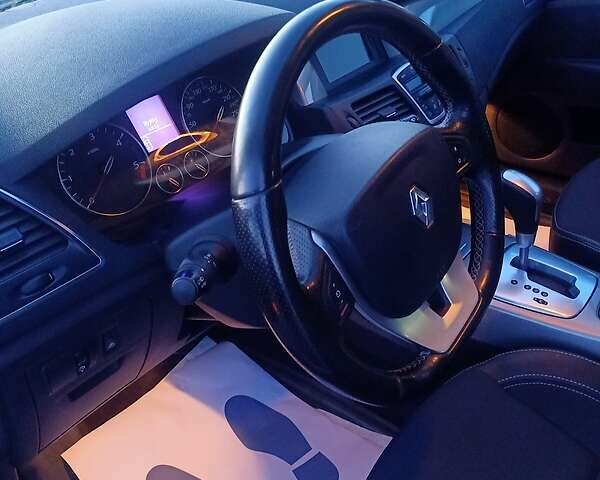 Білий Рено Лагуна, об'ємом двигуна 2 л та пробігом 240 тис. км за 8499 $, фото 71 на Automoto.ua