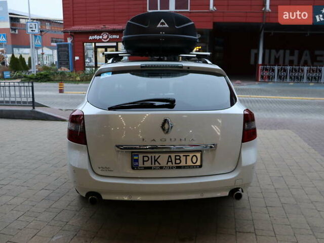 Белый Рено Лагуна, объемом двигателя 2 л и пробегом 247 тыс. км за 9900 $, фото 6 на Automoto.ua