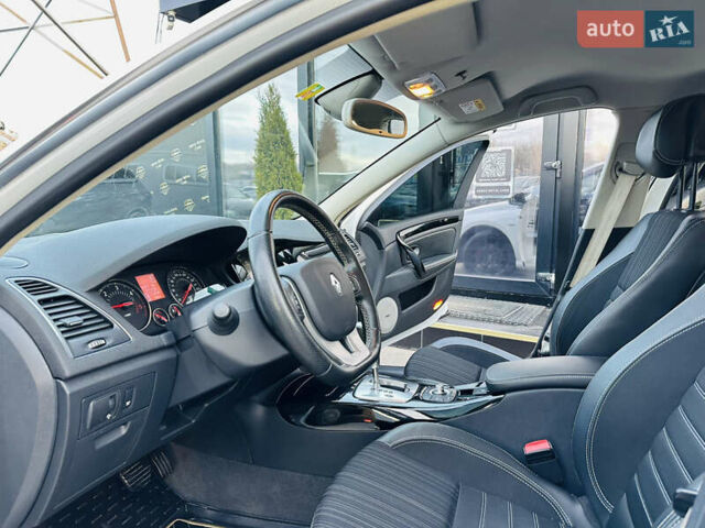 Белый Рено Лагуна, объемом двигателя 2 л и пробегом 166 тыс. км за 9900 $, фото 12 на Automoto.ua