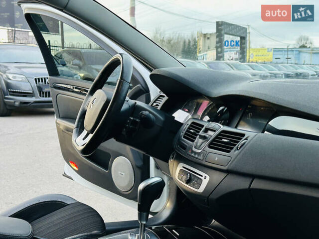 Белый Рено Лагуна, объемом двигателя 2 л и пробегом 166 тыс. км за 9900 $, фото 23 на Automoto.ua