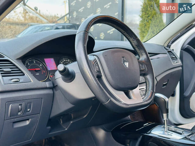 Белый Рено Лагуна, объемом двигателя 2 л и пробегом 166 тыс. км за 9900 $, фото 13 на Automoto.ua