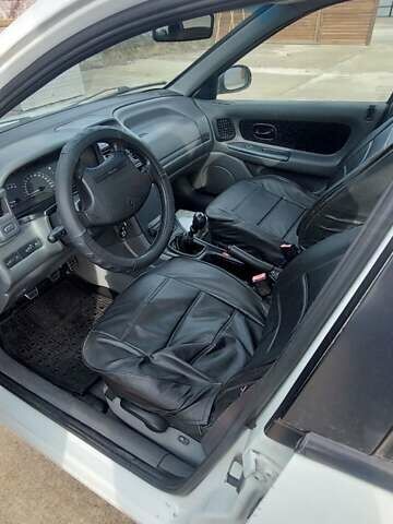 Белый Рено Лагуна, объемом двигателя 2 л и пробегом 420 тыс. км за 1700 $, фото 6 на Automoto.ua