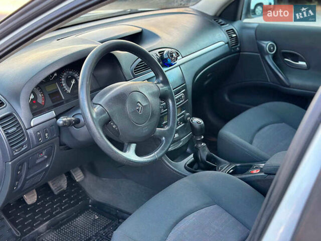 Белый Рено Лагуна, объемом двигателя 1.9 л и пробегом 231 тыс. км за 4990 $, фото 39 на Automoto.ua
