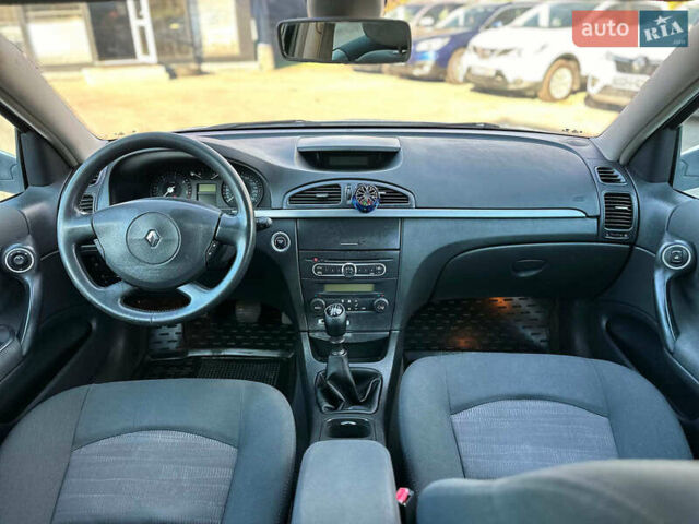 Белый Рено Лагуна, объемом двигателя 1.9 л и пробегом 231 тыс. км за 4990 $, фото 32 на Automoto.ua