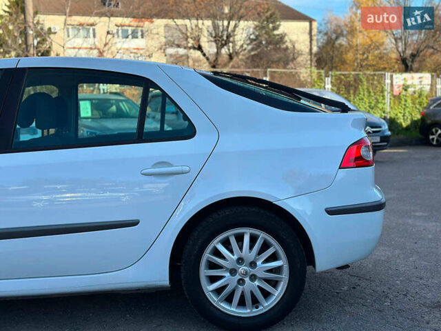 Белый Рено Лагуна, объемом двигателя 1.9 л и пробегом 231 тыс. км за 4990 $, фото 14 на Automoto.ua