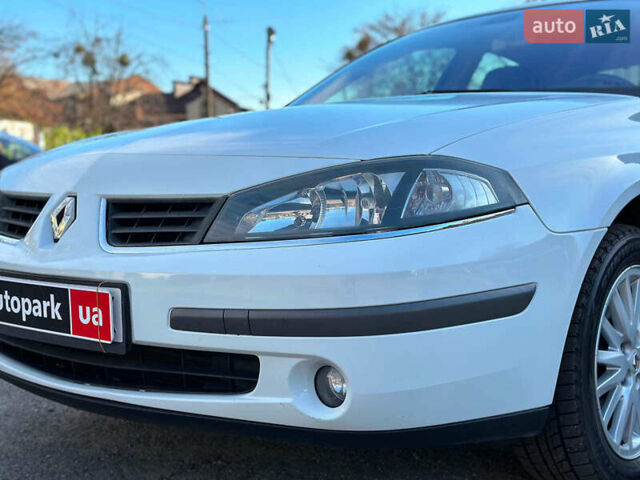 Белый Рено Лагуна, объемом двигателя 1.9 л и пробегом 231 тыс. км за 4990 $, фото 16 на Automoto.ua