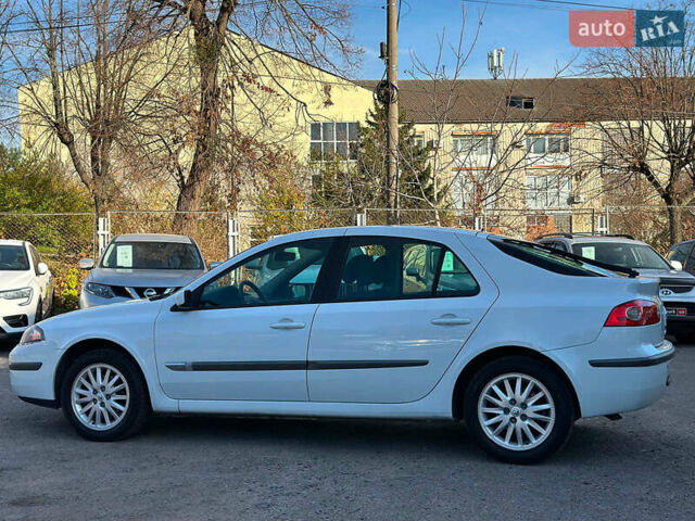 Белый Рено Лагуна, объемом двигателя 1.9 л и пробегом 231 тыс. км за 4990 $, фото 13 на Automoto.ua