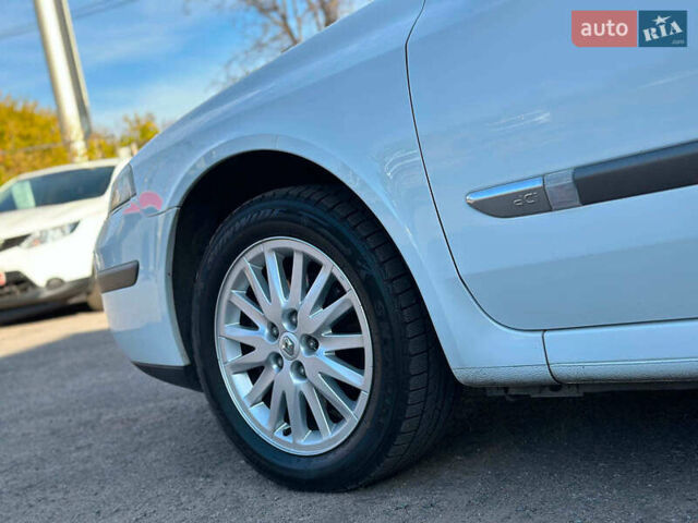 Белый Рено Лагуна, объемом двигателя 1.9 л и пробегом 231 тыс. км за 4990 $, фото 12 на Automoto.ua