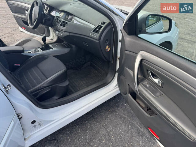 Білий Рено Лагуна, об'ємом двигуна 1.46 л та пробігом 225 тис. км за 6500 $, фото 23 на Automoto.ua