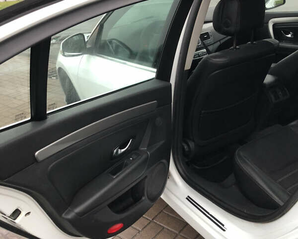 Білий Рено Лагуна, об'ємом двигуна 2 л та пробігом 318 тис. км за 7050 $, фото 32 на Automoto.ua