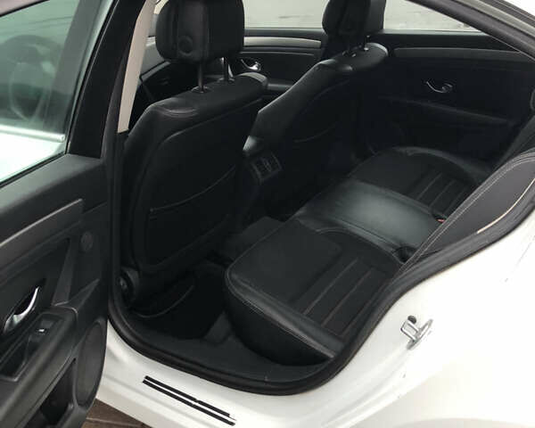 Білий Рено Лагуна, об'ємом двигуна 2 л та пробігом 318 тис. км за 7050 $, фото 31 на Automoto.ua