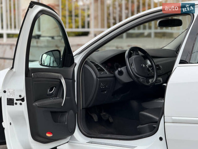 Белый Рено Лагуна, объемом двигателя 2 л и пробегом 246 тыс. км за 7999 $, фото 24 на Automoto.ua