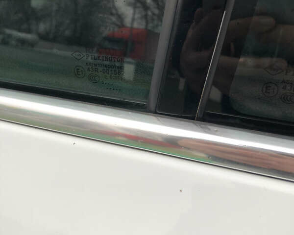 Білий Рено Лагуна, об'ємом двигуна 2 л та пробігом 318 тис. км за 7050 $, фото 20 на Automoto.ua