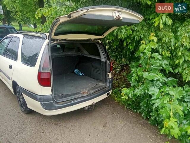 Бежевый Рено Лагуна, объемом двигателя 2.2 л и пробегом 150 тыс. км за 1700 $, фото 9 на Automoto.ua
