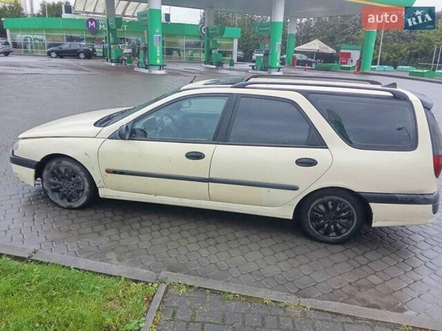 Бежевый Рено Лагуна, объемом двигателя 2.2 л и пробегом 150 тыс. км за 1700 $, фото 1 на Automoto.ua