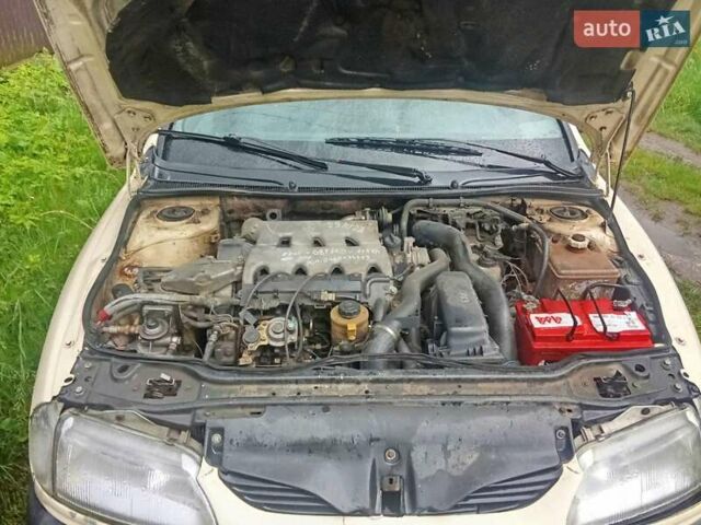 Бежевый Рено Лагуна, объемом двигателя 2.2 л и пробегом 150 тыс. км за 1700 $, фото 14 на Automoto.ua
