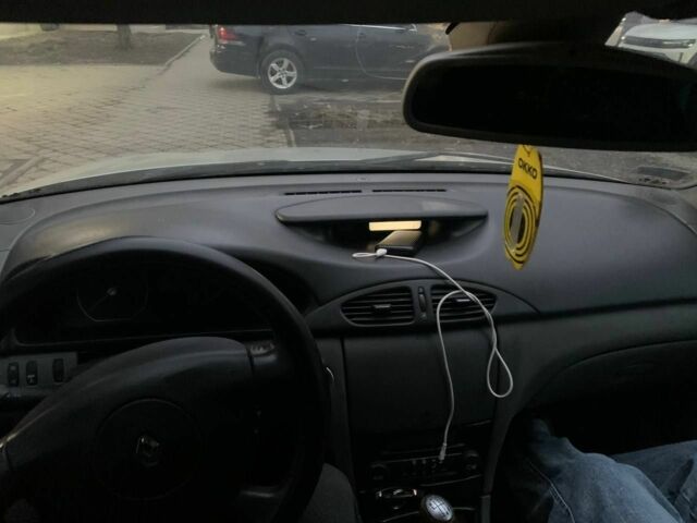 Бежевый Рено Лагуна, объемом двигателя 2.2 л и пробегом 350 тыс. км за 1950 $, фото 4 на Automoto.ua