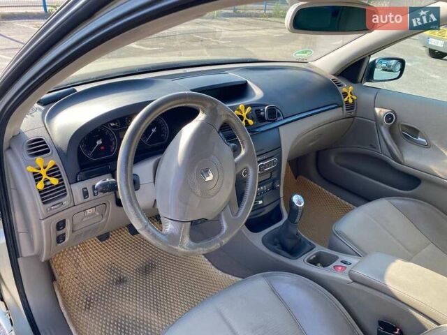 Бежевый Рено Лагуна, объемом двигателя 2 л и пробегом 210 тыс. км за 4800 $, фото 9 на Automoto.ua