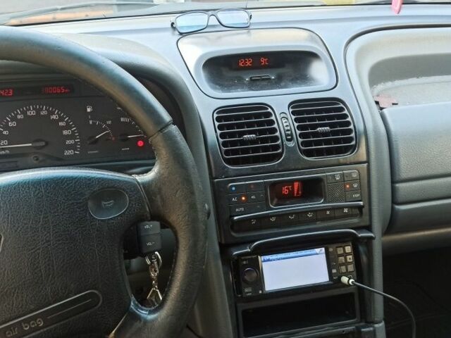 Черный Рено Лагуна, объемом двигателя 2 л и пробегом 383 тыс. км за 1800 $, фото 3 на Automoto.ua