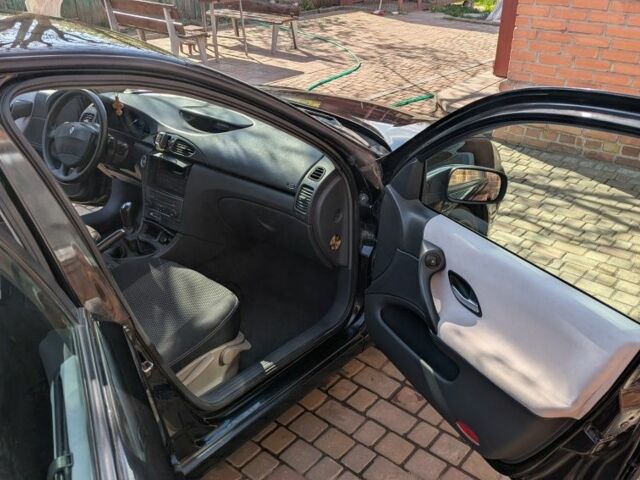 Черный Рено Лагуна, объемом двигателя 1.8 л и пробегом 314 тыс. км за 4200 $, фото 11 на Automoto.ua