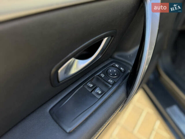 Черный Рено Лагуна, объемом двигателя 2 л и пробегом 284 тыс. км за 6990 $, фото 11 на Automoto.ua