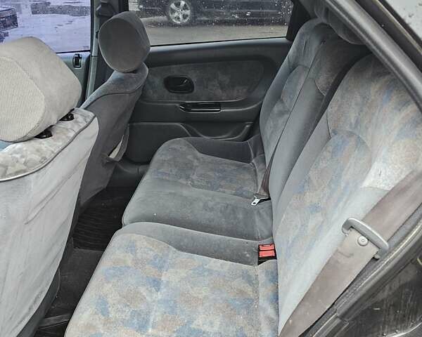 Черный Рено Лагуна, объемом двигателя 2 л и пробегом 200 тыс. км за 1400 $, фото 9 на Automoto.ua