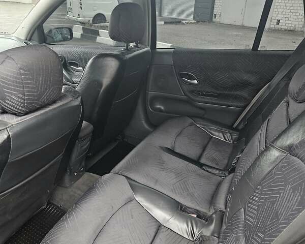 Черный Рено Лагуна, объемом двигателя 1.8 л и пробегом 252 тыс. км за 4000 $, фото 9 на Automoto.ua