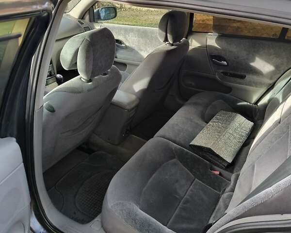 Черный Рено Лагуна, объемом двигателя 1.87 л и пробегом 210 тыс. км за 3800 $, фото 15 на Automoto.ua