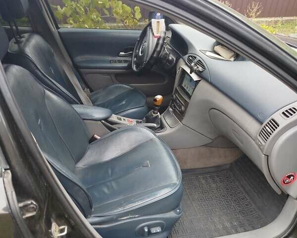 Черный Рено Лагуна, объемом двигателя 2.2 л и пробегом 287 тыс. км за 3950 $, фото 3 на Automoto.ua