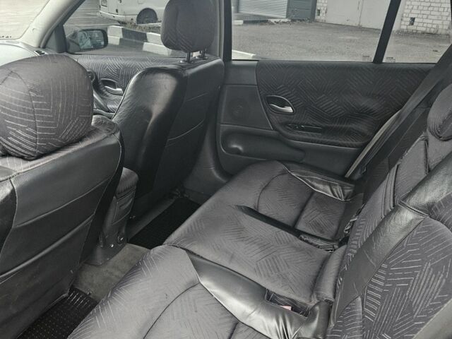 Черный Рено Лагуна, объемом двигателя 1.8 л и пробегом 252 тыс. км за 4000 $, фото 9 на Automoto.ua