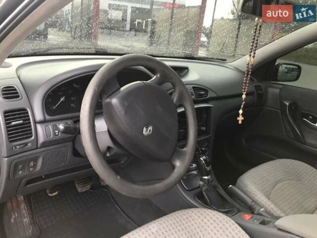 Черный Рено Лагуна, объемом двигателя 1.6 л и пробегом 360 тыс. км за 2900 $, фото 1 на Automoto.ua