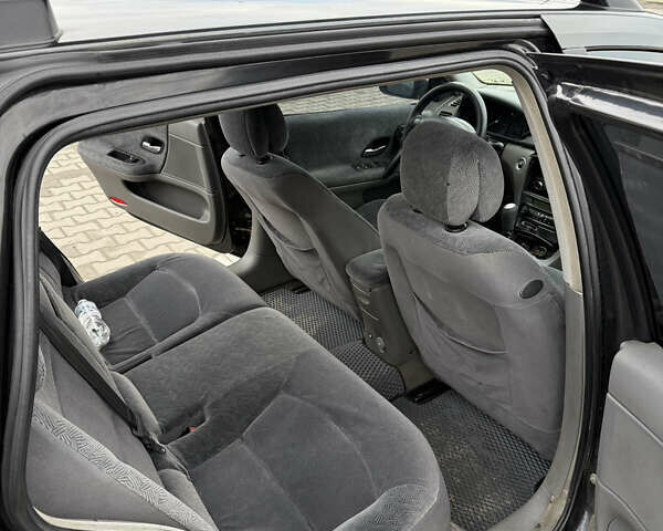 Черный Рено Лагуна, объемом двигателя 1.87 л и пробегом 325 тыс. км за 3599 $, фото 7 на Automoto.ua
