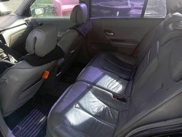 Черный Рено Лагуна, объемом двигателя 2.2 л и пробегом 325 тыс. км за 1400 $, фото 1 на Automoto.ua