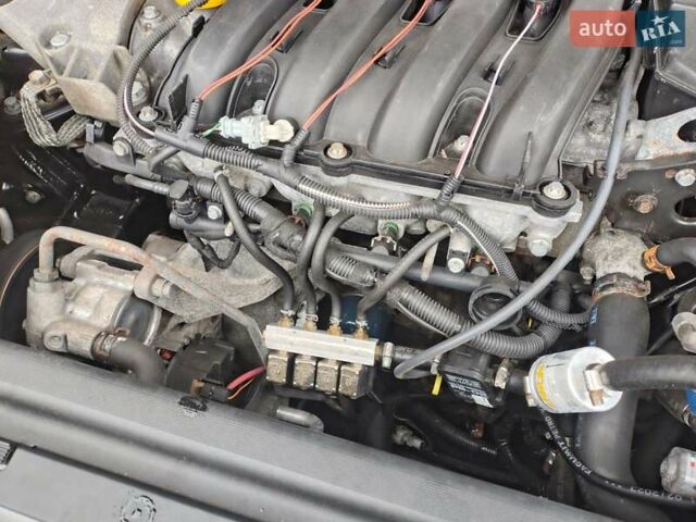 Черный Рено Лагуна, объемом двигателя 1.78 л и пробегом 375 тыс. км за 2950 $, фото 32 на Automoto.ua