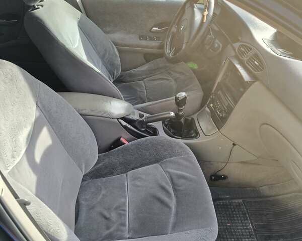 Черный Рено Лагуна, объемом двигателя 1.87 л и пробегом 210 тыс. км за 3800 $, фото 17 на Automoto.ua