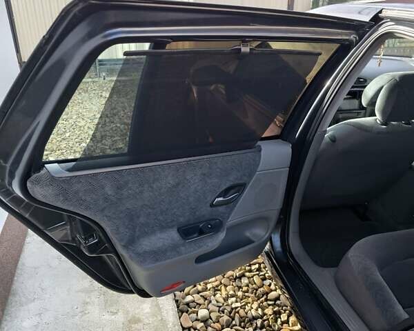 Черный Рено Лагуна, объемом двигателя 1.87 л и пробегом 210 тыс. км за 3800 $, фото 16 на Automoto.ua