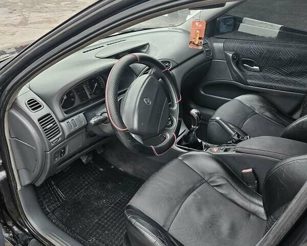 Черный Рено Лагуна, объемом двигателя 1.8 л и пробегом 252 тыс. км за 4000 $, фото 8 на Automoto.ua