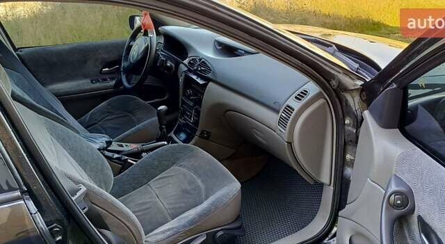 Черный Рено Лагуна, объемом двигателя 1.9 л и пробегом 320 тыс. км за 3100 $, фото 3 на Automoto.ua