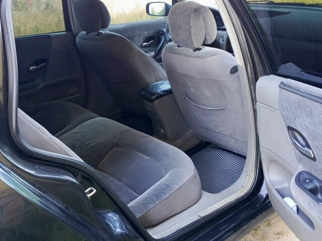 Черный Рено Лагуна, объемом двигателя 1.9 л и пробегом 320 тыс. км за 3000 $, фото 4 на Automoto.ua