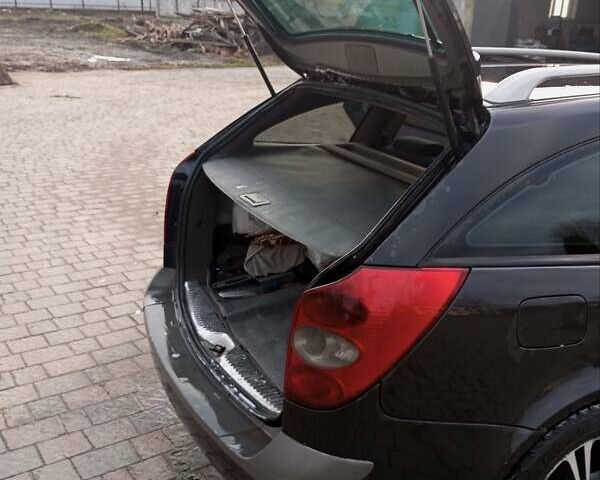 Черный Рено Лагуна, объемом двигателя 1.87 л и пробегом 400 тыс. км за 3550 $, фото 1 на Automoto.ua